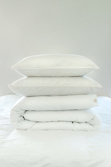Organic Cotton Percale duvet cover set with a white duvet cover and two white pillowcases.