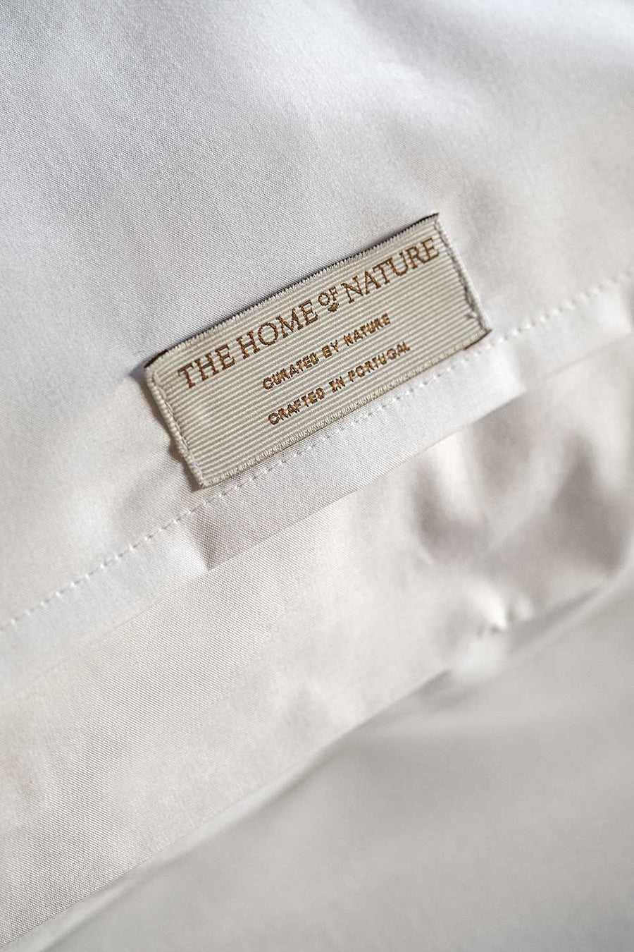 Label from The Nature Home on a white Egyptian Cotton™ Percale pillowcase.