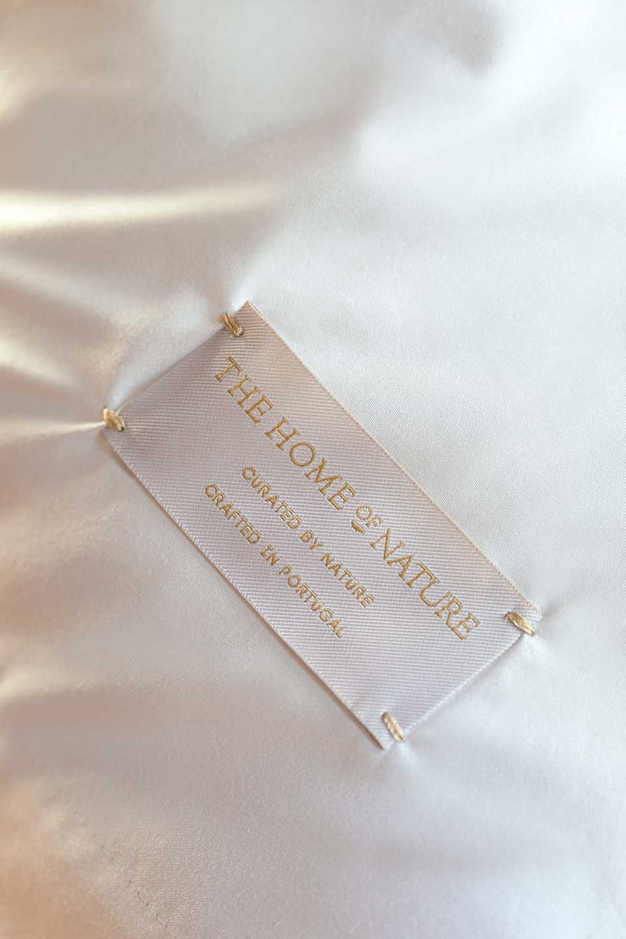 Label from The Nature Home on a white pillowcase in Egyptian Cotton™ Sateen.