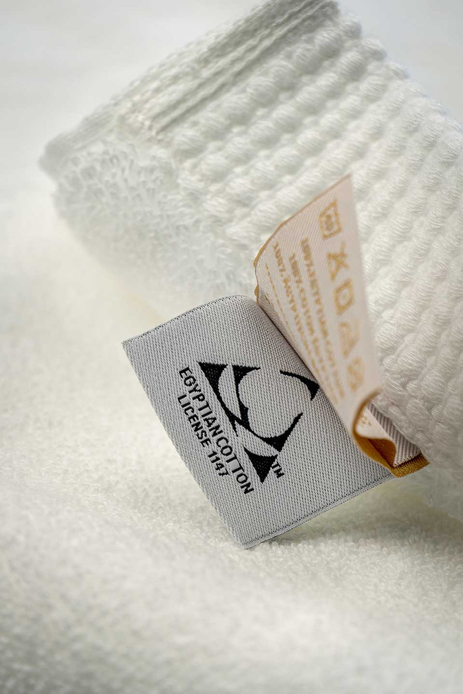 Egyptian Cotton™ seal on a white Egyptian Cotton™ Bath Mat.